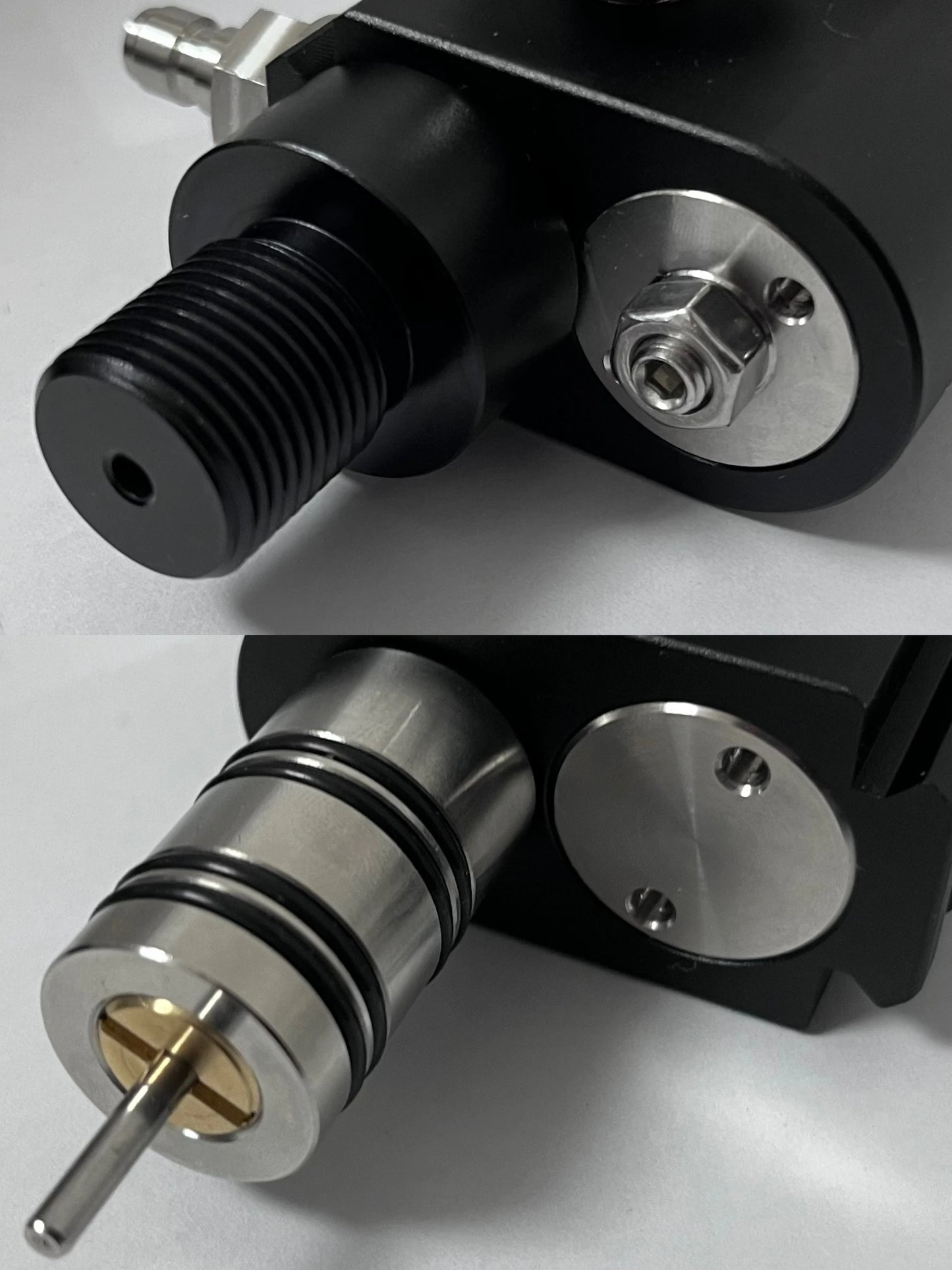 Close-up of mechanical components with a focus on metal parts and screws.
