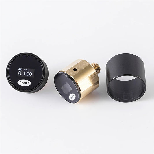 Three cylindrical devices with digital displays on a white background