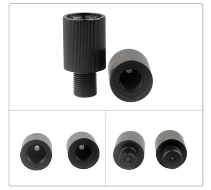 Set of black and gray threaded metal connectors on a white background