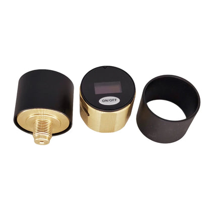 Three black and gold components on a white background