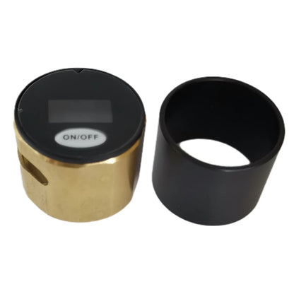 Gold and black cylindrical device with 'ON/OFF' label on a white background