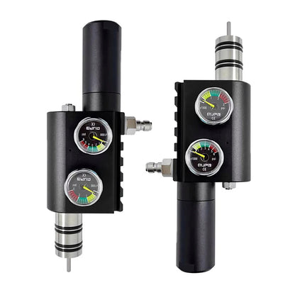 Two black regulators with gauges on a white background