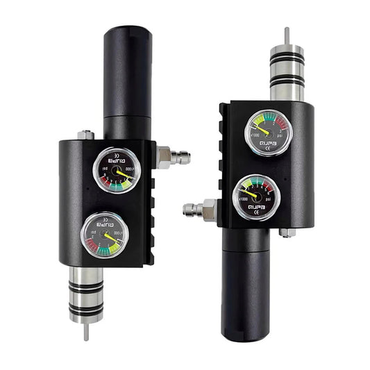 Two black regulators with gauges on a white background