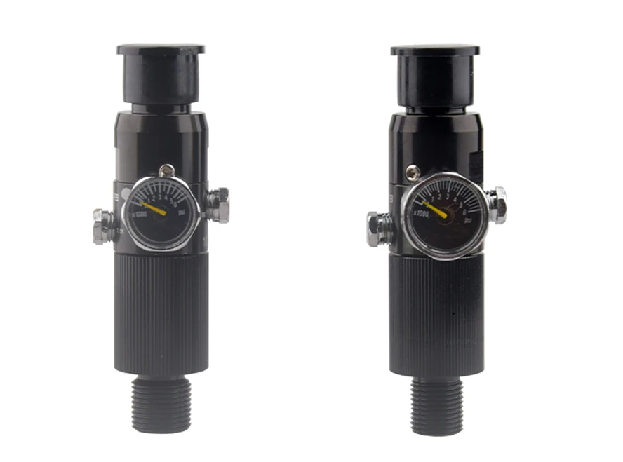 Two black pressure regulators with gauges on a white background