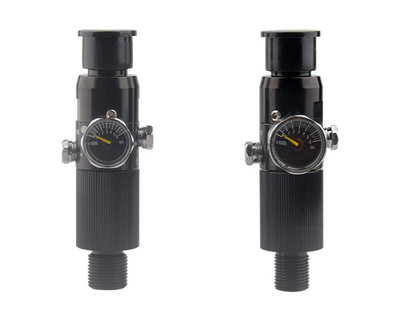 Two black pressure regulators with gauges on a white background